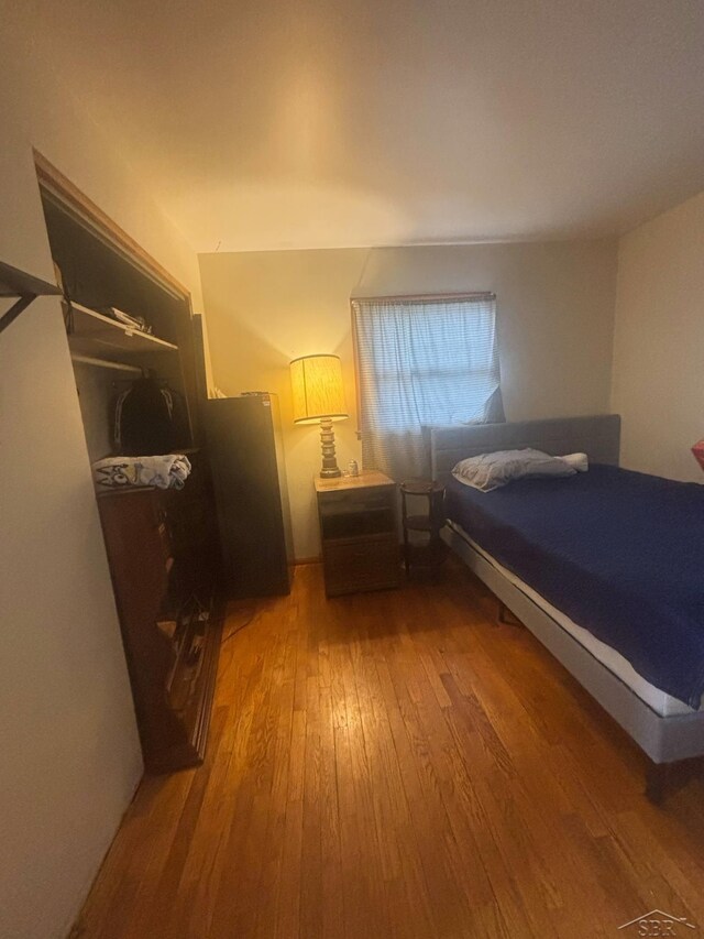 2220 Alice St, Farwell, MI 48622 - bedroom with wood-type flooring