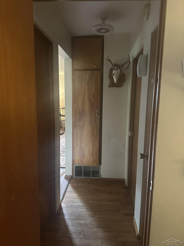 2220 Alice St, Farwell, MI 48622 - corridor featuring wood-type flooring and baseboards