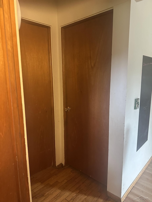 2220 Alice St, Farwell, MI 48622 - corridor featuring light wood-style floors
