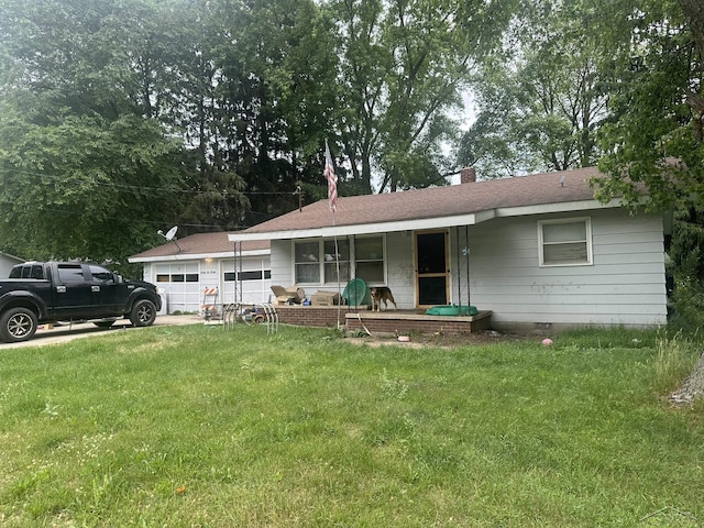 2220 Alice St, Farwell, MI 48622 - ranch-style home with covered porch, a garage, a front lawn, and a chimney