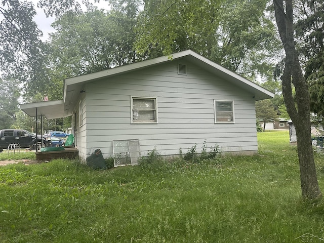 2220 Alice St, Farwell, MI 48622 - view of property exterior with a lawn