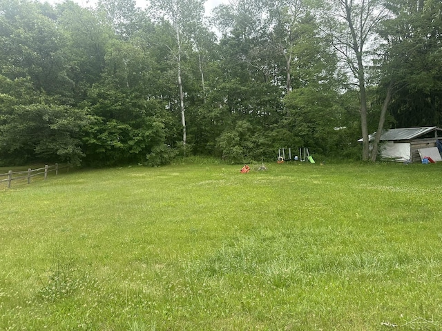 2220 Alice St, Farwell, MI 48622 - view of yard featuring a shed