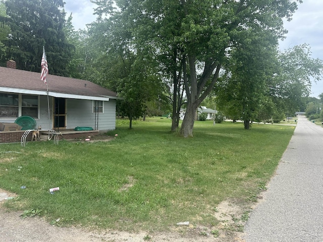 2220 Alice St, Farwell, MI 48622 - view of green lawn