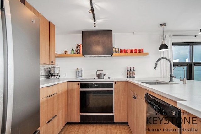 600 Broadway Ave NW Unit 409B, Grand Rapids, MI 49504 - kitchen with freestanding refrigerator, open shelves, ventilation hood, dishwashing machine, and wall oven