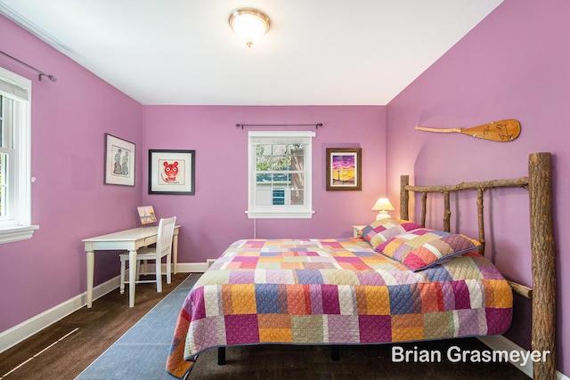 539 Overbrook Ln SE, Grand Rapids, MI 49507 - carpeted bedroom featuring baseboards