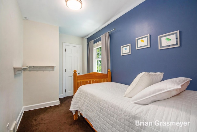 539 Overbrook Ln SE, Grand Rapids, MI 49507 - carpeted bedroom with baseboards and a closet
