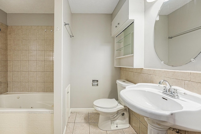 1921 Cornelius Ave SE, Grand Rapids, MI 49507 - bathroom featuring tile patterned floors and a combined bath / shower with jetted tub