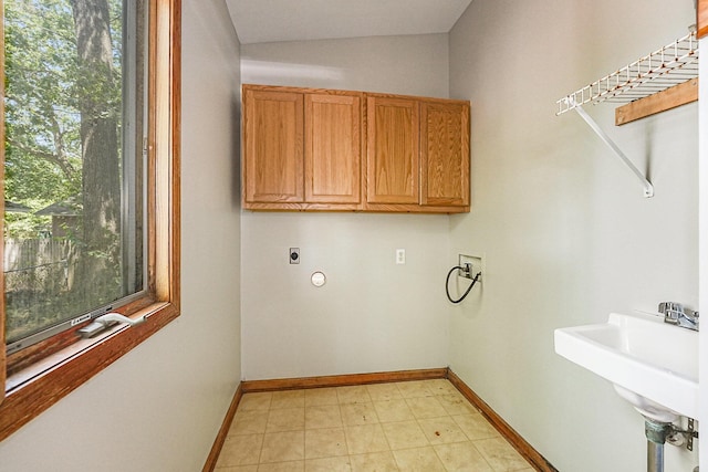 1921 Cornelius Ave SE, Grand Rapids, MI 49507 - laundry room featuring washer hookup, cabinet space, and hookup for an electric dryer