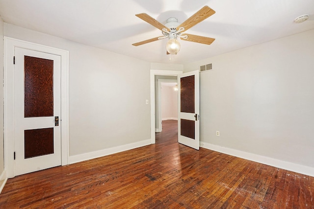 1921 Cornelius Ave SE, Grand Rapids, MI 49507 - unfurnished room with a smoke detector, wood-type flooring, and ceiling fan