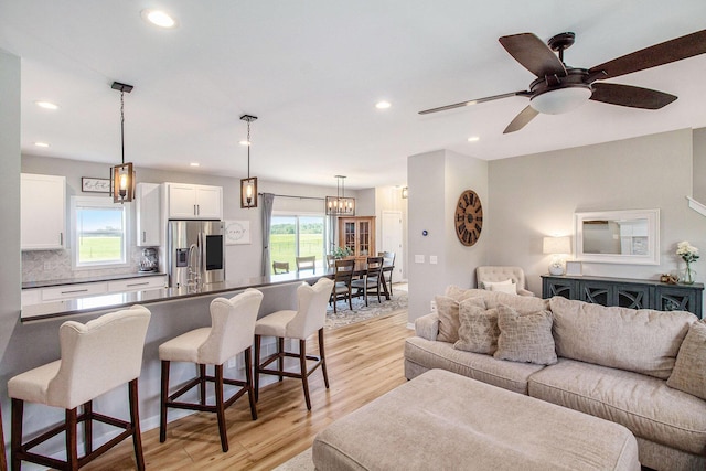 11539 Warrior Trl, Grass Lake, MI 49240 - living room featuring light wood-type flooring, recessed lighting, and a ceiling fan