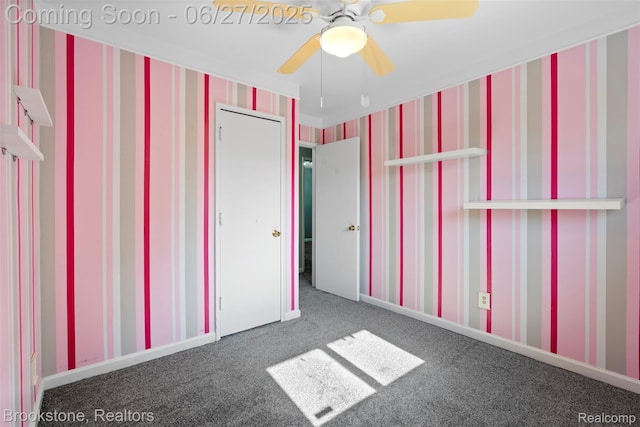 1293 Moulin Ave, Madison Heights, MI 48071 - unfurnished bedroom featuring carpet and a ceiling fan