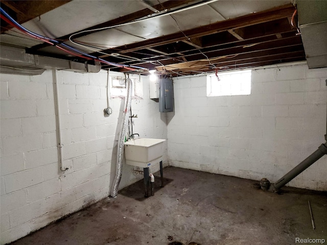 14119 Whitcomb St, Detroit, MI 48227 - below grade area featuring electric panel and a sink