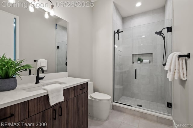 927 Ann St, Birmingham, MI 48009 - bathroom featuring vanity, a shower stall, and tile patterned floors