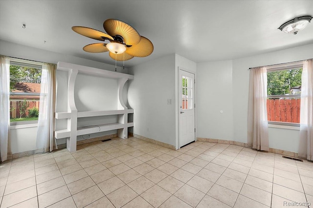 17677 Denby, Redford, MI 48240 - spare room with light tile patterned flooring, plenty of natural light, and ceiling fan