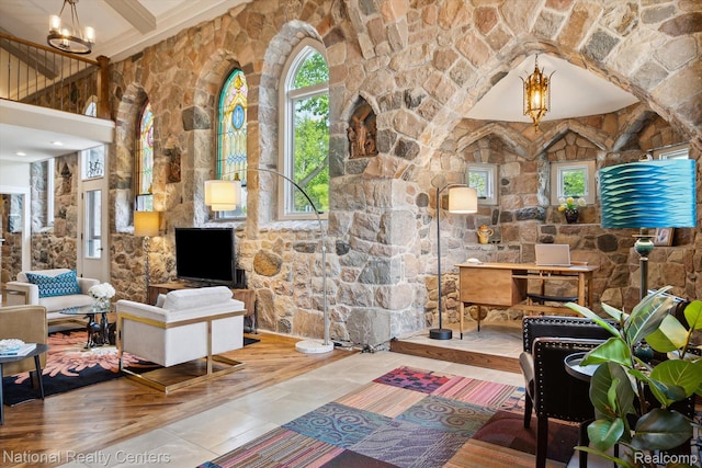 229 E Commerce St Unit 1, Milford, MI 48381 - living area featuring a chandelier
