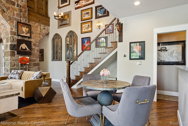 229 E Commerce St Unit 1, Milford, MI 48381 - dining space with stairs, a chandelier, wood finished floors, and recessed lighting