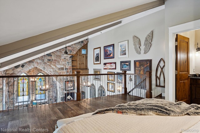 229 E Commerce St Unit 1, Milford, MI 48381 - bedroom with wood finished floors and high vaulted ceiling