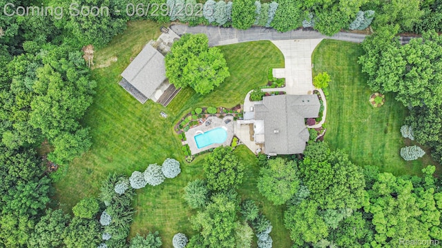 4301 Rolling Acres Dr, Hartland, MI 48353 - aerial view of property and surrounding area with a pool area