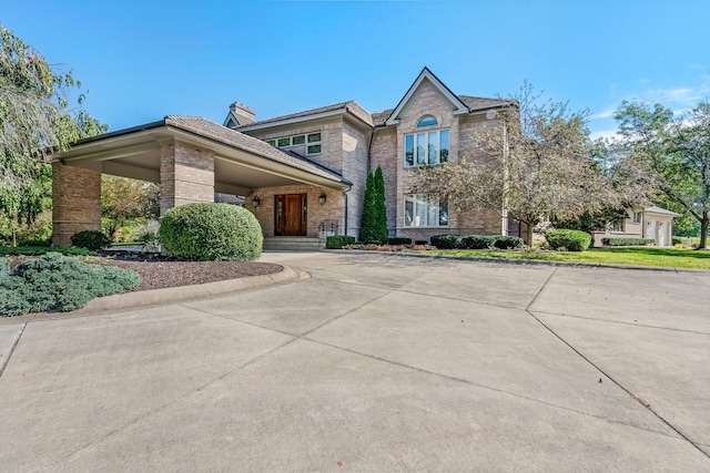 861 S 800 W, Indiana, IN 46341 - traditional-style home featuring brick siding and a chimney