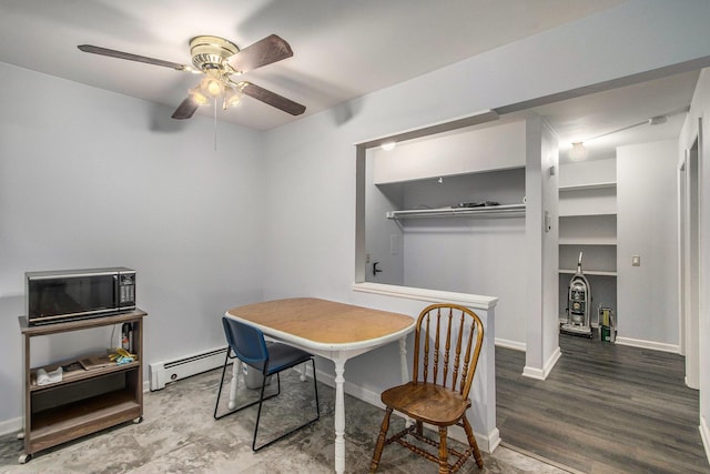 616 Lynn Ave Unit 21, Kalamazoo, MI 49008 - dining area with baseboard heating, a ceiling fan, and wood finished floors