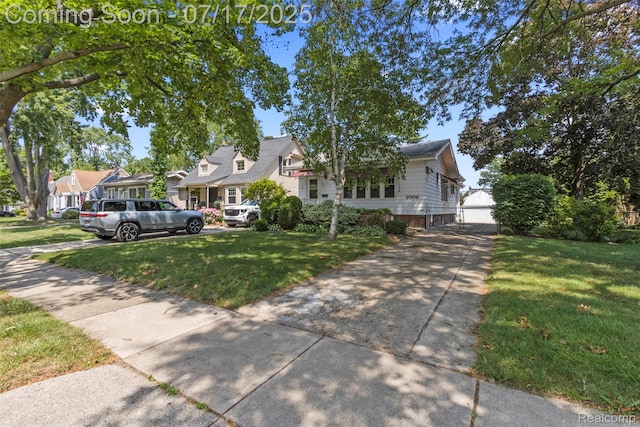 2006 N Connecticut Ave, Royal Oak, MI 48073 - view of front of property featuring a front yard, a residential view, and driveway