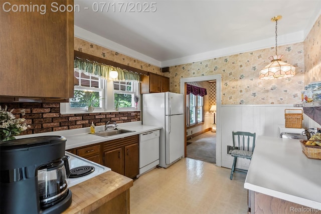 2006 N Connecticut Ave, Royal Oak, MI 48073 - kitchen with white appliances, wallpapered walls, plenty of natural light, wainscoting, and light countertops