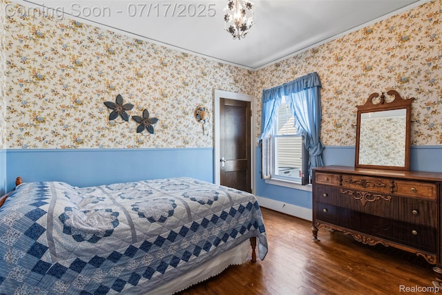 2006 N Connecticut Ave, Royal Oak, MI 48073 - bedroom with a wainscoted wall, wallpapered walls, wood finished floors, and ornamental molding