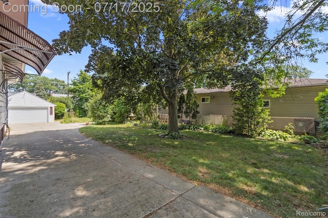 2006 N Connecticut Ave, Royal Oak, MI 48073 - view of green lawn with an outbuilding