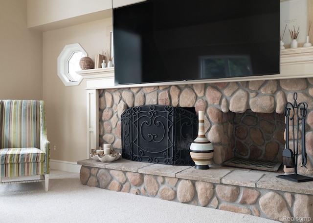 3831 Woodland Dr, Highland, MI 48356 - detailed view of carpet floors and a stone fireplace