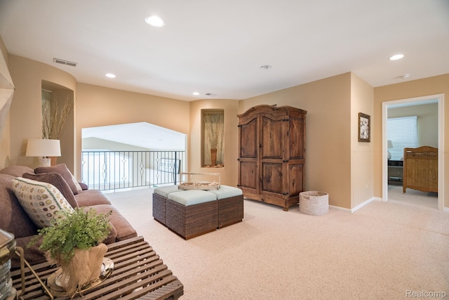 3831 Woodland Dr, Highland, MI 48356 - living area with light colored carpet and recessed lighting