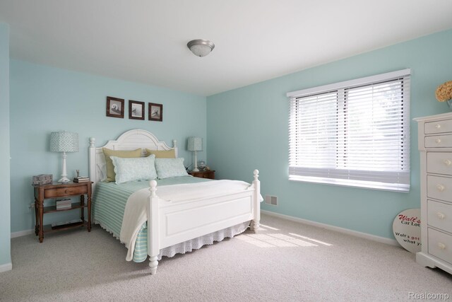 3831 Woodland Dr, Highland, MI 48356 - bedroom with carpet