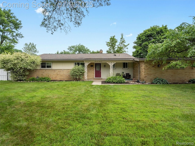 32000 Coronet Dr, Farmington, MI 48334 - single story home featuring brick siding, a chimney, and a front lawn