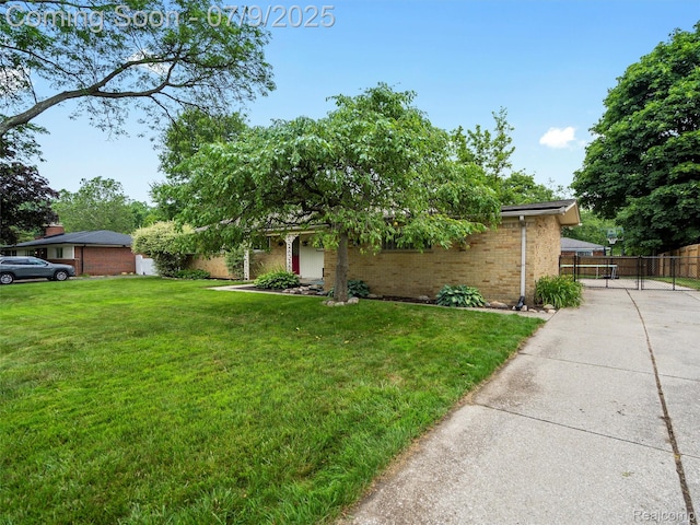 32000 Coronet Dr, Farmington, MI 48334 - obstructed view of property featuring brick siding