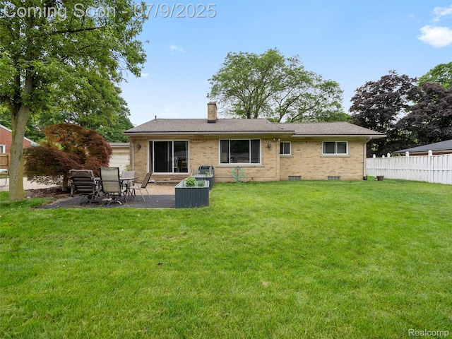 32000 Coronet Dr, Farmington, MI 48334 - back of property featuring a chimney, a patio area, and brick siding