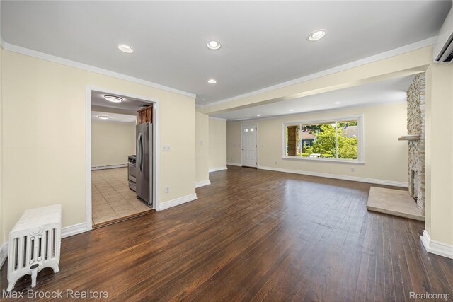 643 Spencer St, Ferndale, MI 48220 - unfurnished living room with dark wood-type flooring, radiator, recessed lighting, crown molding, and a baseboard heating unit