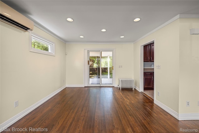 643 Spencer St, Ferndale, MI 48220 - spare room with an AC wall unit, radiator, healthy amount of natural light, dark wood-style floors, and crown molding