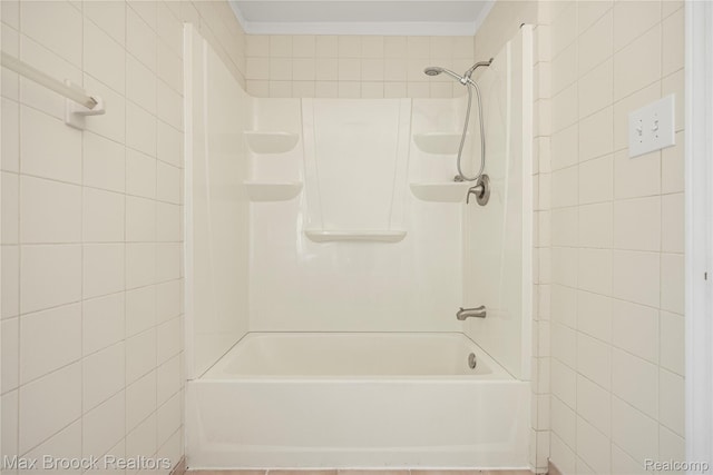 643 Spencer St, Ferndale, MI 48220 - bathroom featuring tile walls, crown molding, and  shower combination