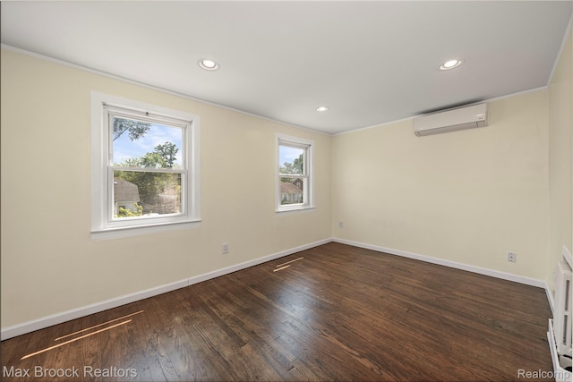 643 Spencer St, Ferndale, MI 48220 - empty room with a wall unit AC, wood finished floors, recessed lighting, and ornamental molding