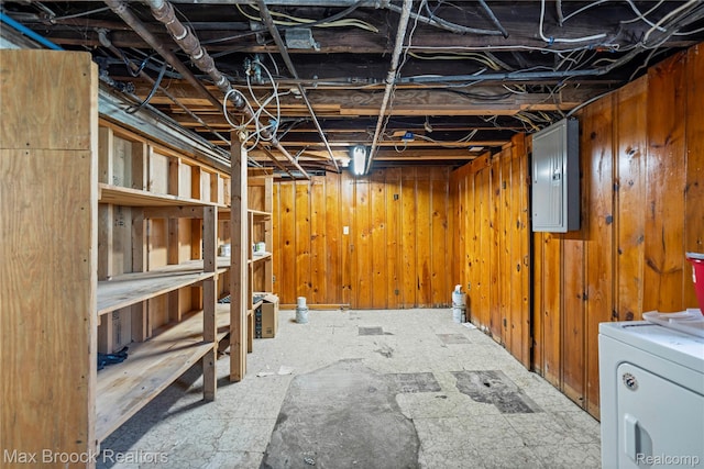 643 Spencer St, Ferndale, MI 48220 - unfinished below grade area featuring washer / dryer, electric panel, and wooden walls