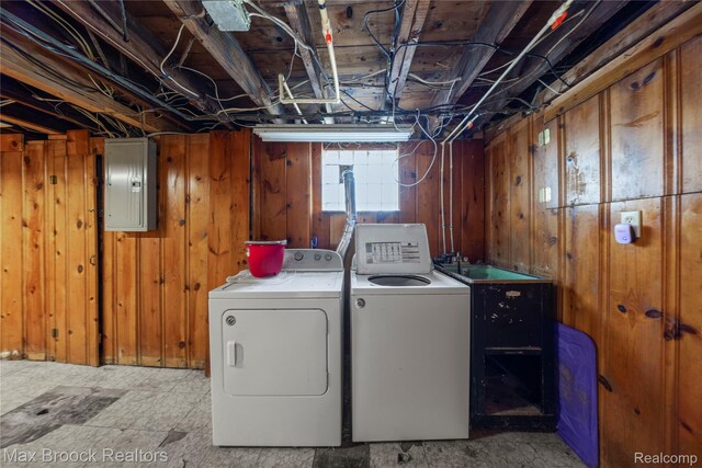 643 Spencer St, Ferndale, MI 48220 - washroom featuring electric panel, washer and dryer, and wood walls