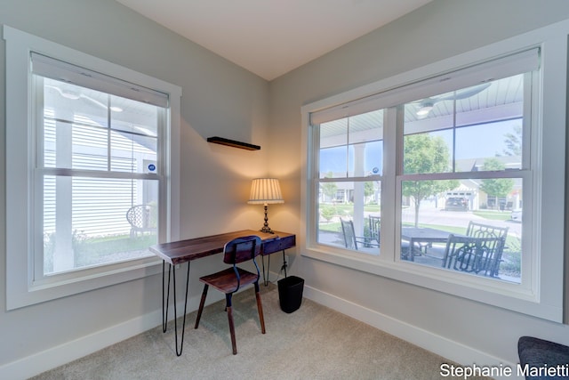 675 Terrace Point Dr, Muskegon, MI 49440 - office area with healthy amount of natural light and carpet