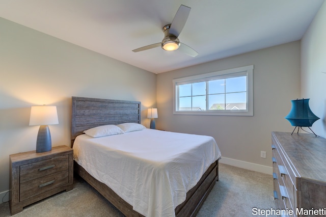 675 Terrace Point Dr, Muskegon, MI 49440 - bedroom with light colored carpet and a ceiling fan