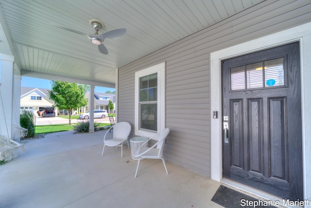 675 Terrace Point Dr, Muskegon, MI 49440 - porch featuring a ceiling fan