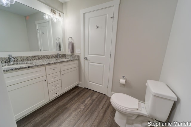 675 Terrace Point Dr, Muskegon, MI 49440 - bathroom with wood finished floors and double vanity