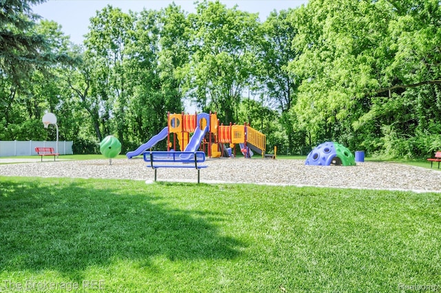491 Harrison Dr, Davison, MI 48423 - community jungle gym featuring view of wooded area