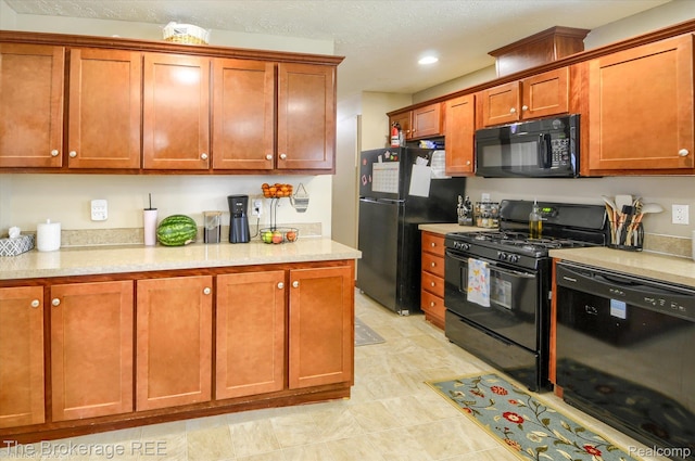 491 Harrison Dr, Davison, MI 48423 - kitchen featuring black appliances, brown cabinetry, and recessed lighting