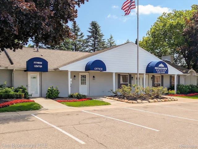 491 Harrison Dr, Davison, MI 48423 - view of building exterior featuring uncovered parking