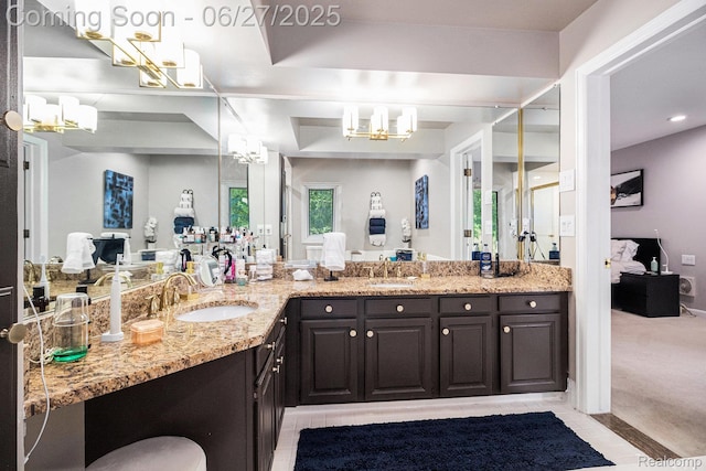 4469 Tanbark St, Bloomfield Hills, MI 48302 - bathroom featuring a chandelier, double vanity, ensuite bathroom, tile patterned floors, and recessed lighting
