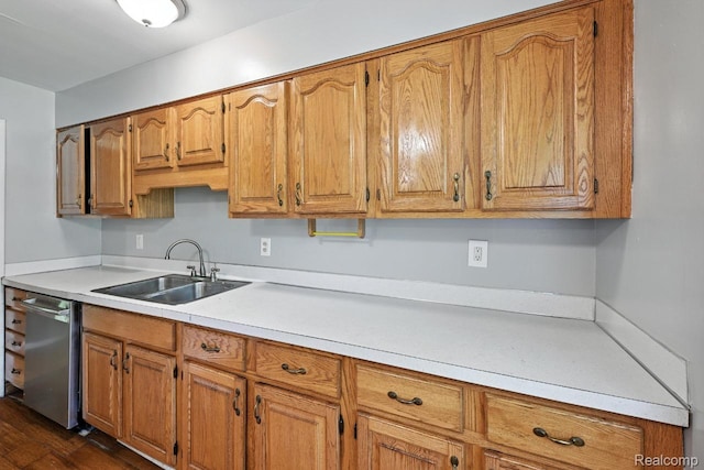1935 Carmanbrook Pkwy, Flint, MI 48507 - kitchen with dishwasher, light countertops, brown cabinetry, and dark wood-type flooring