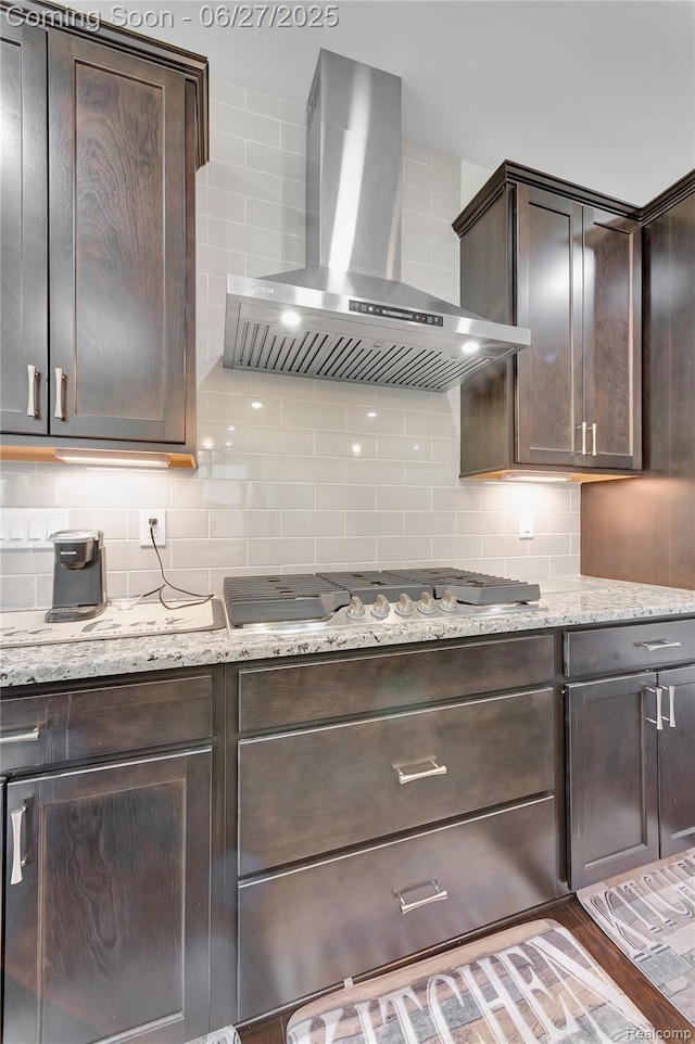 38731 Chasewood Ct, Farmington Hills, MI 48335 - kitchen featuring wall chimney exhaust hood, dark brown cabinets, and backsplash